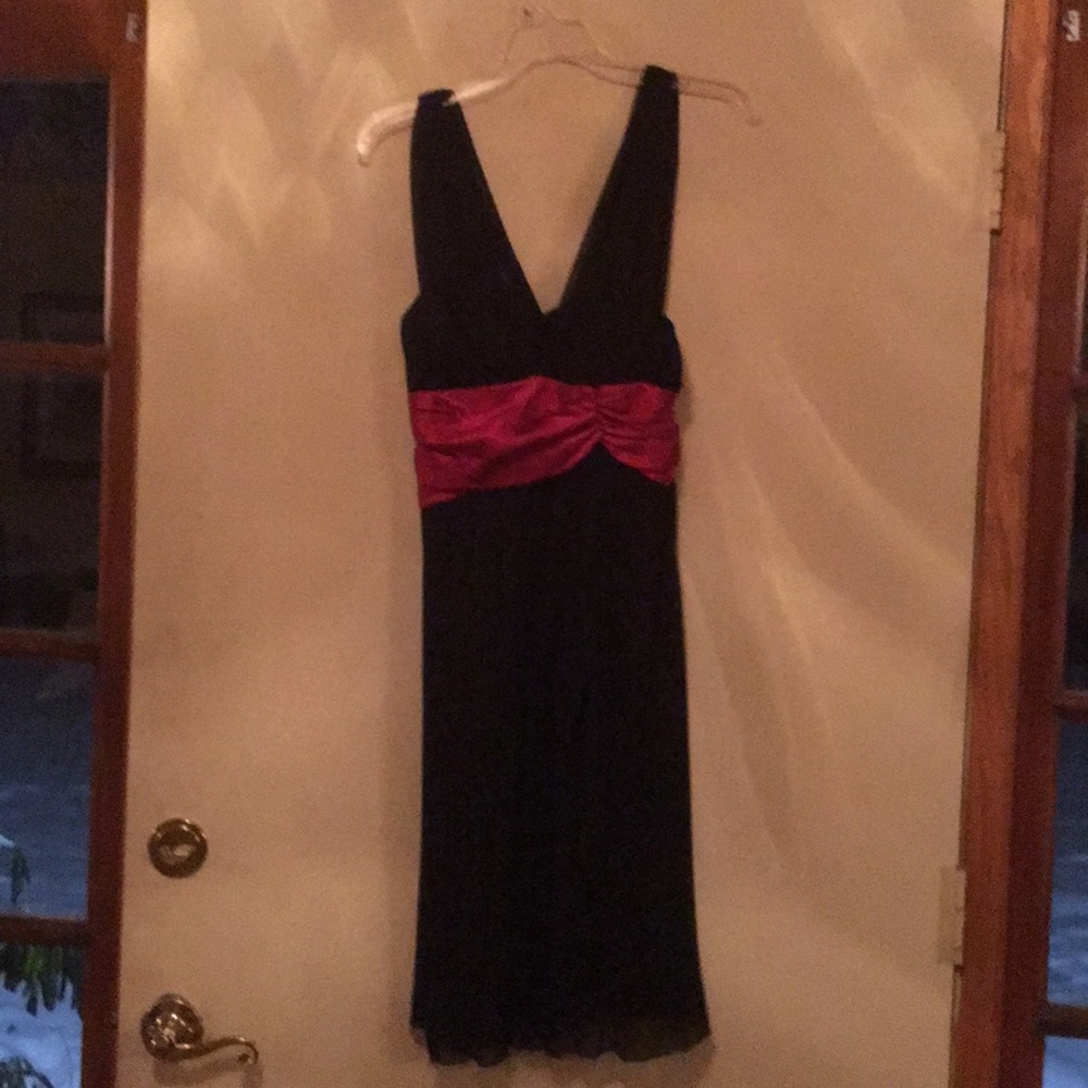 Black sheer prom dress with burgundy shash